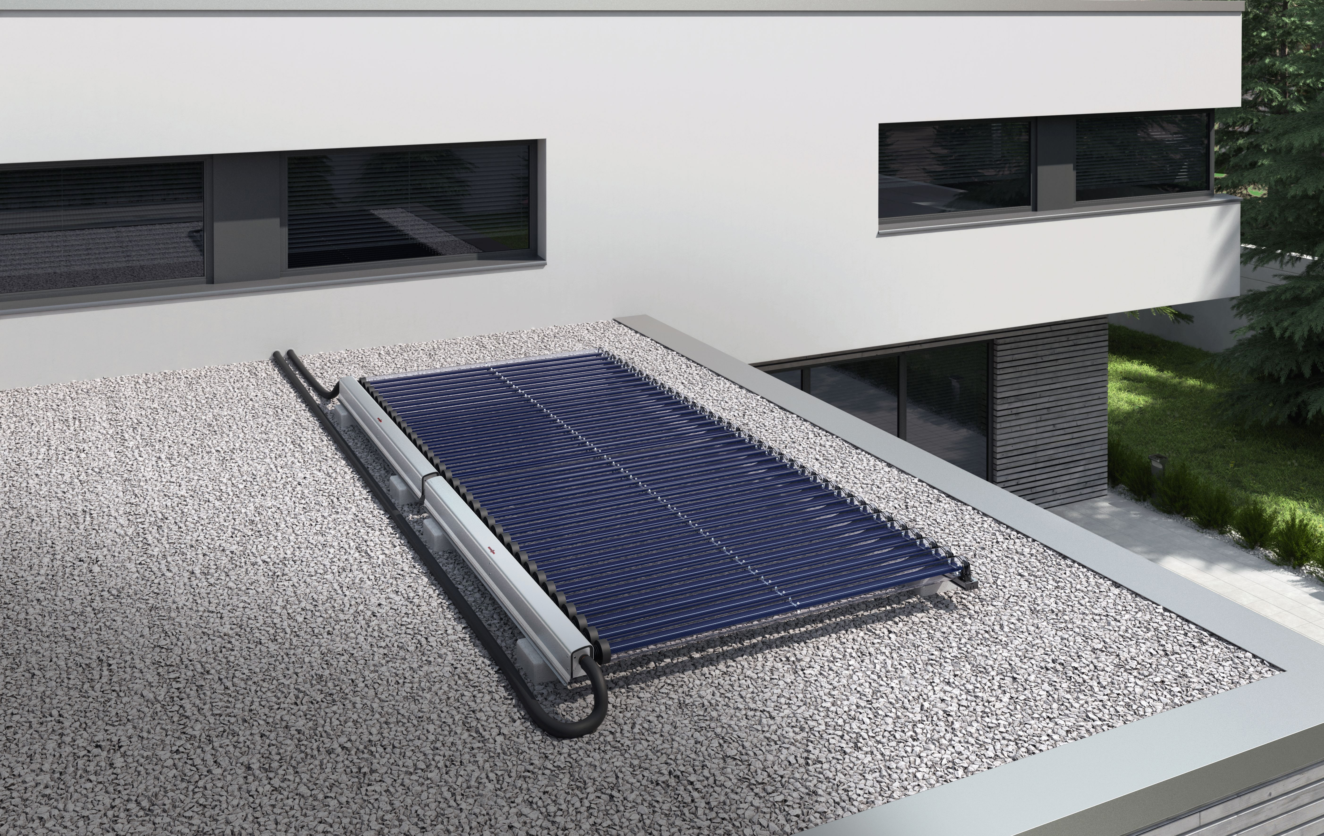 Solarkollektoren auf einem Flachdach eines modernen Gebäudes